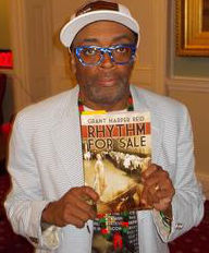 Spike Lee holding Rhythm For Sale
