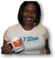 Author Monda Webb with an AALBC.com Coffee Mug