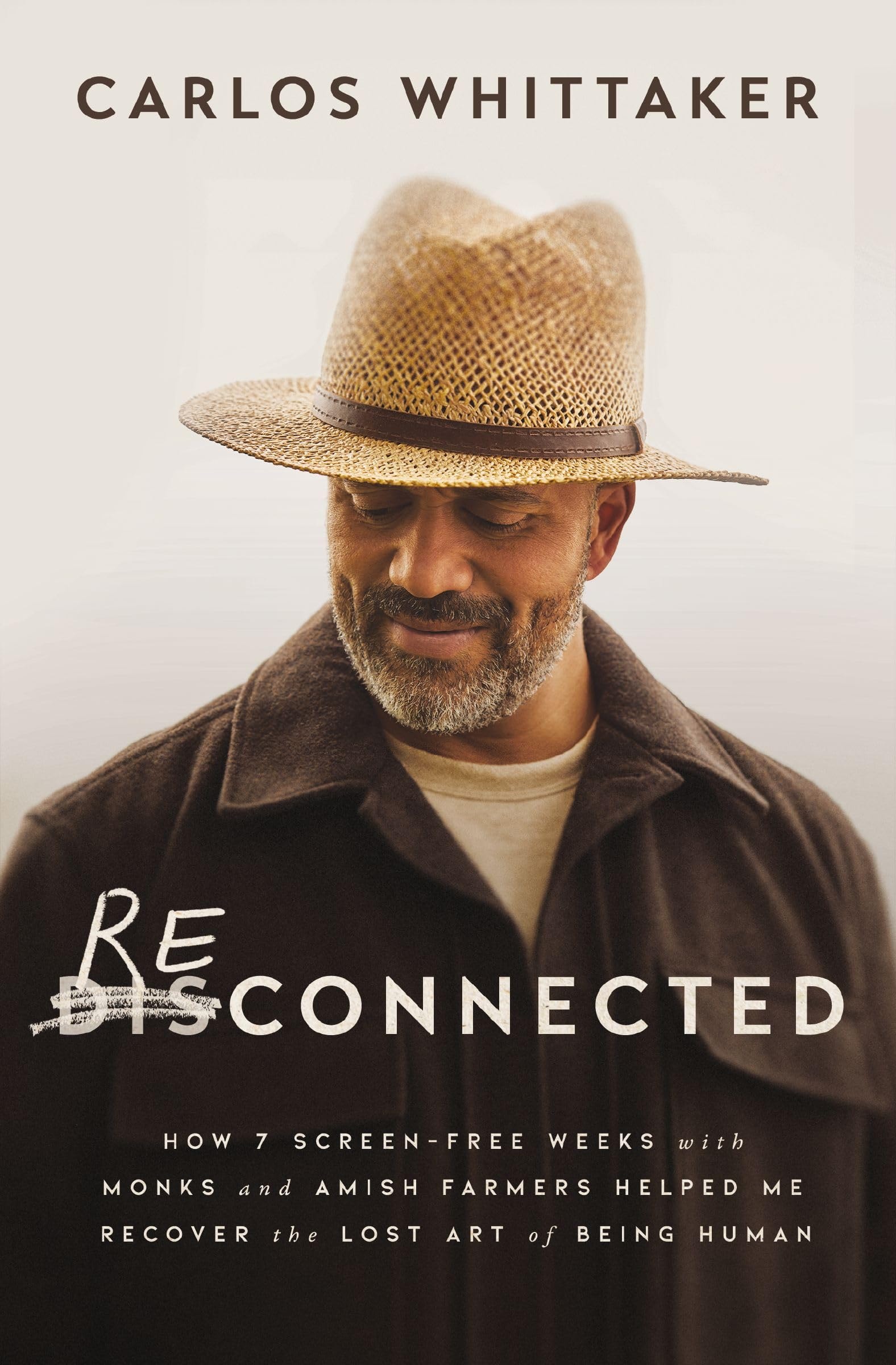 Book Cover Reconnected: How 7 Screen-Free Weeks with Monks and Amish Farmers Helped Me Recover the Lost Art of Being Human by Carlos Whittaker