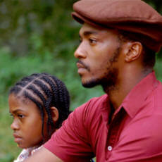 Jamara Griffin and Anthony Mackie in NIGHT CATCHES US, a Magnolia Pictures release. Photo courtesy of Magnolia Pictures.