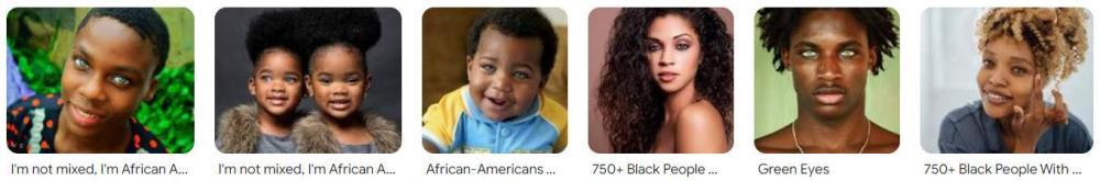 photo of a dark skinned people with naturally green eyes